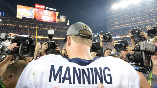 Denver Broncos QB Peyton Manning's son reaches for the Lombardi trophy at Super  Bowl 50 at Levi's Stadium in Santa Clara, California on February 7, 2016.  Denver wins Super Bowl 50 defeating