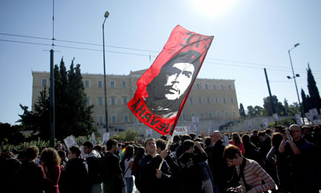 People demonstrate in front of the Greek parliament in Athens 