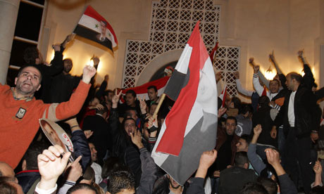 Syrians protest outside the Qatari Embassy in Damascus 