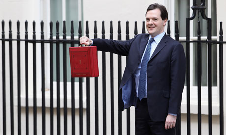 Chancellor of the Exchequer George Osborne poses for photographers outside 11 Downing Street