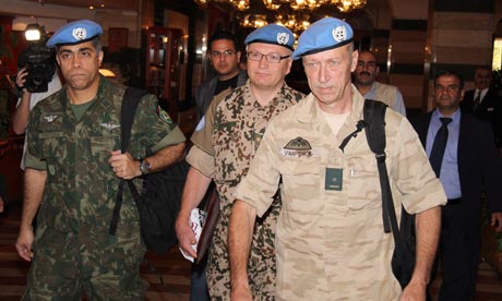 UN observers leave the Sheraton Hotel in Damascus, Syria