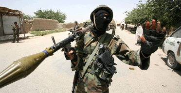 Afghan National Army (ANA) troops on patrol in Laskhar Gah, the capital of Helmand province in southern Afghanistan
