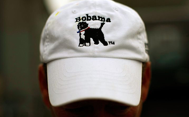 John Farrington of Edgartown, Massachusetts on Martha's Vineyard shows off the Bobama hat he designed in honour of Bo, the Obama family dog