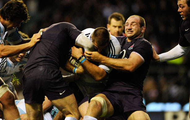 England v Argentina: Steve Borthwick tackles the opposition captain Fernandez Lobbe