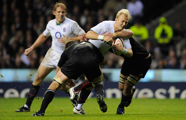 England v All Blacks: Shane Geraghty is stopped by McCaw and Read