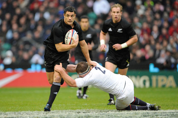 England v All Blacks: Dan Carter hands off Dylan Hartley
