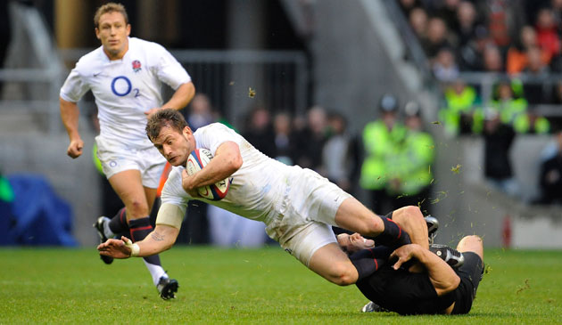 England v All Blacks: Dan Carter tackles Mark Cueto