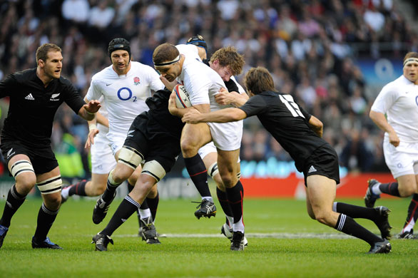 England v All Blacks: Joe Worsley is tackled by Adam Thomson and has to go off injured