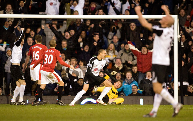 Fulham v Manchester Utd: Bobby Zamora wheels away in celebration after scoring Fulham's second