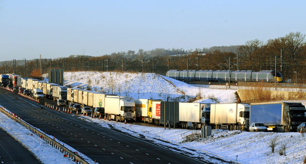 Eurostar delays: A Eurostar test train passes freight traffic held on the M20 motorway