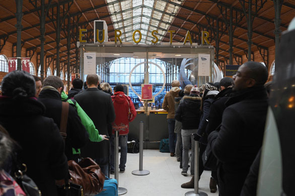 Eurostar delays: Travellers queue for information at Paris Gare du Nord station