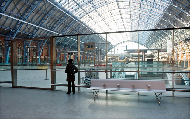 Eurostar delays: A passenger looks at the empty platforms at St Pancras 