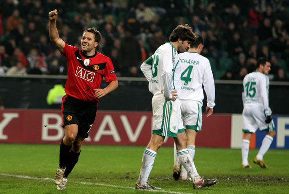 Man Utd & Chelsea: Michael Owen celebrates after scoring his second goal against Wolfsburg