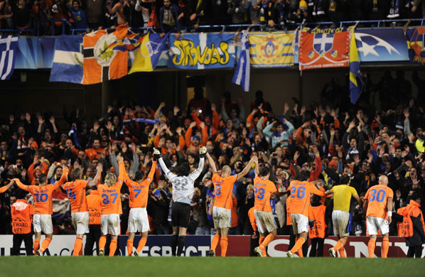 Man Utd & Chelsea: The Apoel players celebrate the draw with their overjoyed fans