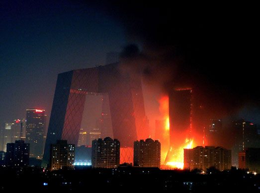 http://static.guim.co.uk/sys-images/Guardian/Pix/pictures/2009/2/10/1234264658902/Beijing-fire-Fire-at-the--002.jpg