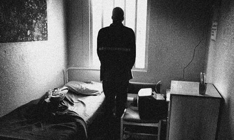 An inmate in his cell at Feltham Young Offenders Institution