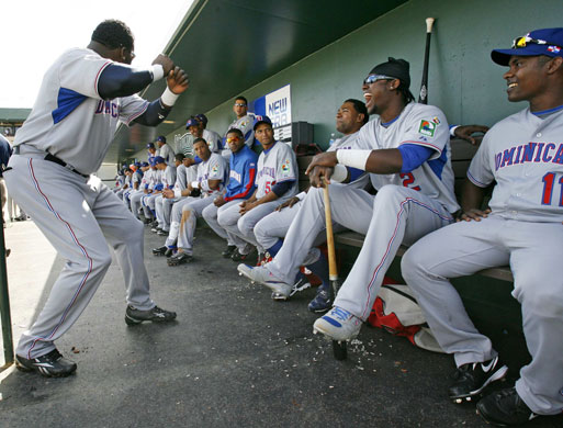 24 Sport: Dominican Republic's David Ortiz jokes in the dugout