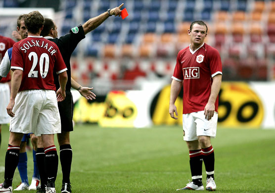 Hot headed Rooney: Rooney receives red card during match against Porto in Amsterdam