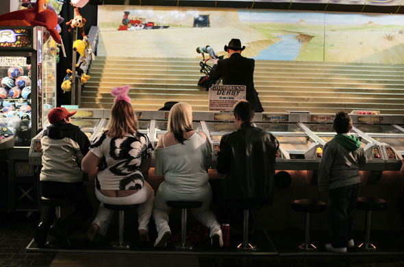 Butlins Bognor Regis: Teenagers play the Gold Rush Derby game at Butlins in Bognor Regis