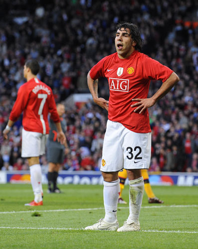 Man Utd v Arsenal: Carlos Tevez reacts after missing a sitter