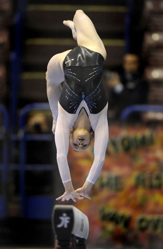 Sport: 24 hours: Romania's Sandra Raluca Izbasa performs on the beam 