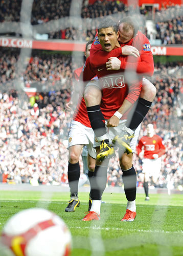 record transfers: Cristiano Ronaldo celebrates scoring from the penalty spot