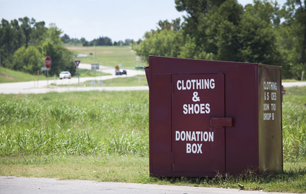 Grapes of Wrath I: A clothing and shoes donation box on the roadside near Bristow