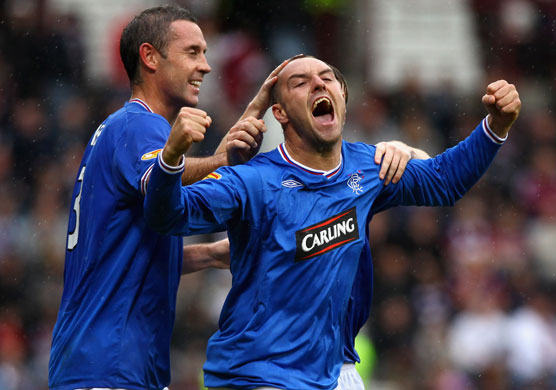 1 champ league draw: Ranger's Kris Boyd celebrates after scoring against Hearts