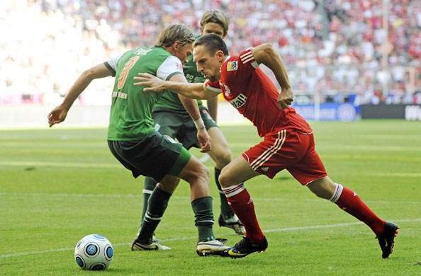 2 champ league: Bayern Munich's Franck Ribery gets past Werder Bremen's Clemens Fritz