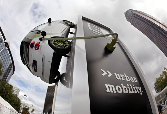 Frankfurt motor show: A Smart electro drive car hangs from a column outside 