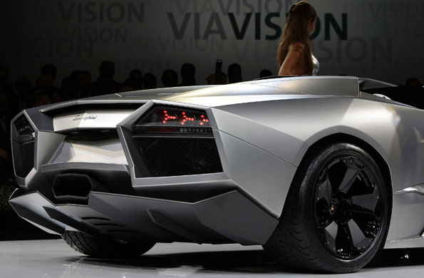 Frankfurt motor show: A model poses next to the new Lamborghini Reventon sports car
