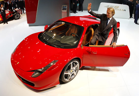 Frankfurt motor show: President of Fiat group Luca di Montezemolo with the Ferrari 458 Italia