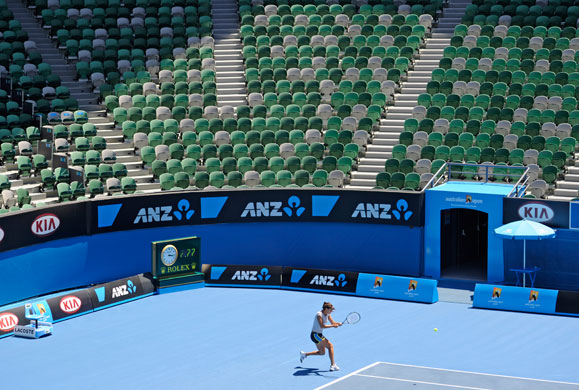 24sport: Ana Ivanovic returns the ball during practice ahead of the Australian Open 