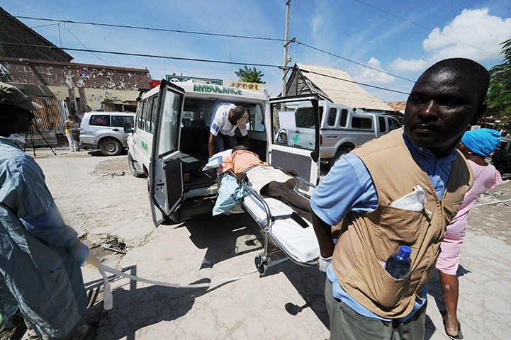 Cholera in Haiti: A sick person arrives by ambulance for medical treatment