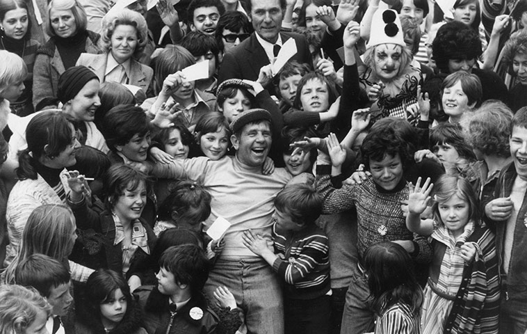 Norman Wisdom: Norman Wisdom amidst a crowd of young fans in Finsbury Park