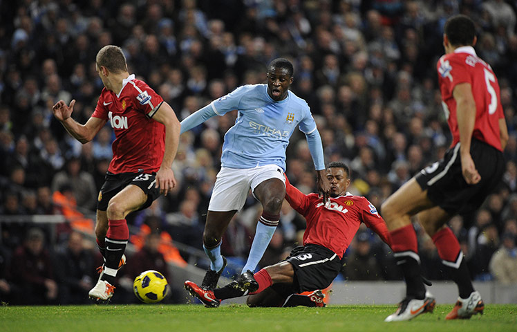 Man City v Man Utd: Evra slides in to dispossess Yaya Toure