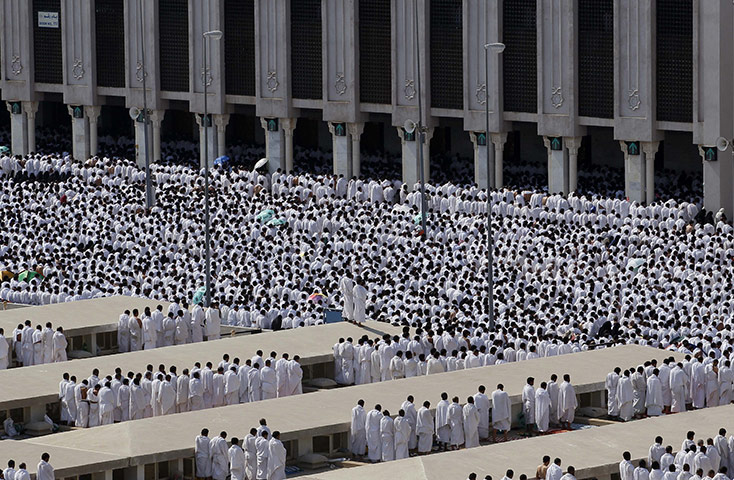 Hajj in Mecca: Muslim pilgrim pray outside Namira mosque in Arafat near Mecca