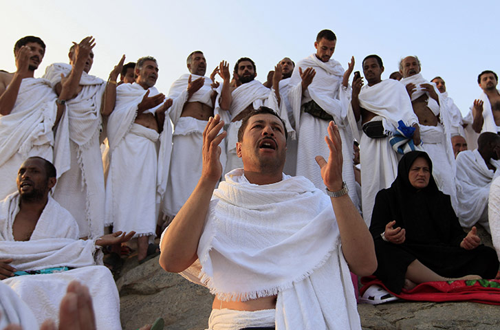 Hajj in Mecca: Muslim pilgrims pray on a rocky hill called the Mountain of Mercy