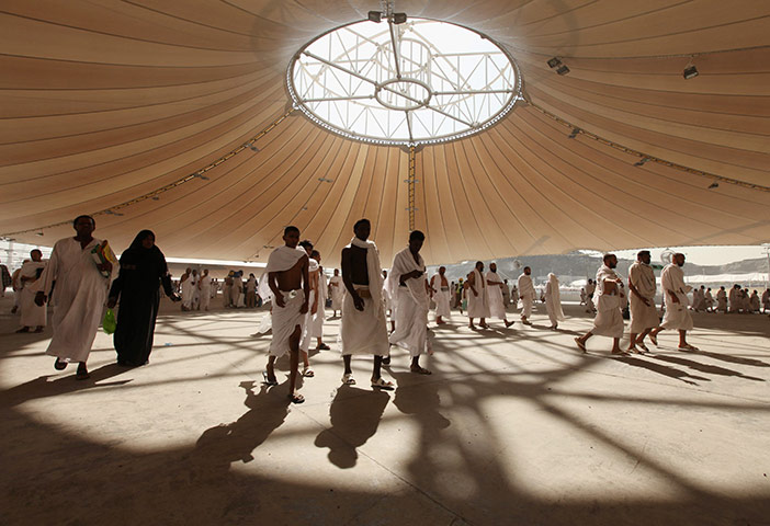 Hajj Pilgimage: Muslim pilgrims arrive to cast stones at pillars symbolising Satan in Mena