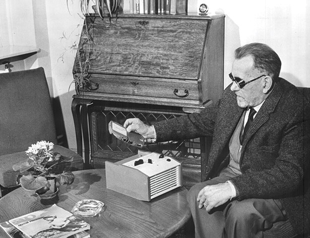 75th Anniversary of RNIB Talking Books: A man listens to his gramophone at home in the thirties