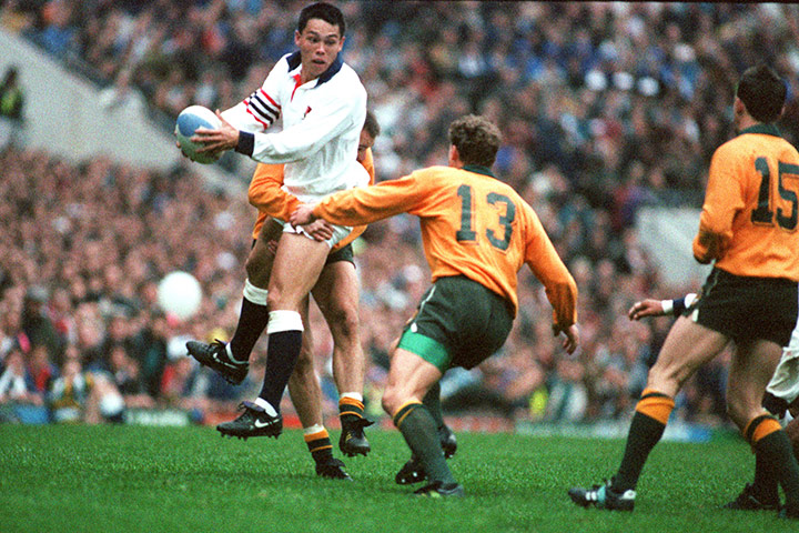 England Rugby Kits: England's Rory Underwood is stopped by Australia's Edgerton & Little