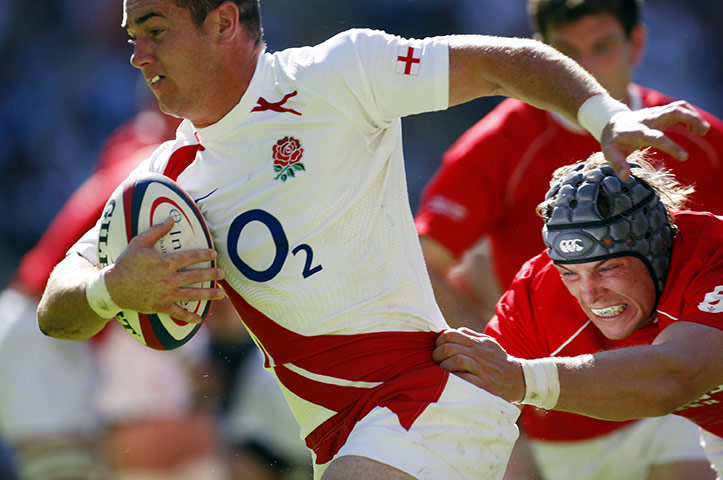 England Rugby Kits: England's Shaun Perry breaks a tackle from Wales' Alun Wyn Jones 