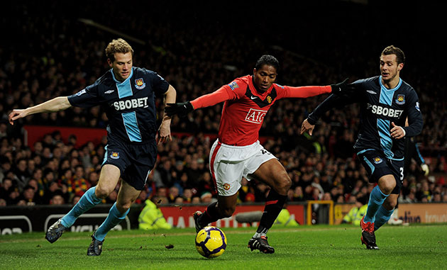 Wednesday football: Antonio Valencia tries to go past Jonathan Spector and Alessandro Diamanti 