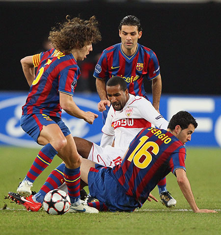 Wednesday football: Charles Puyol, Rafael Marquez, Sergio Busquets tackle Cacau