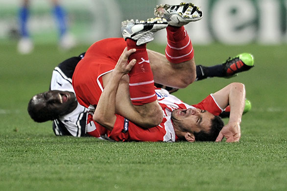 Wednesday football: Bordeaux's Ludovic Sane and Olympiacos' Ieroklis Stoltidis 