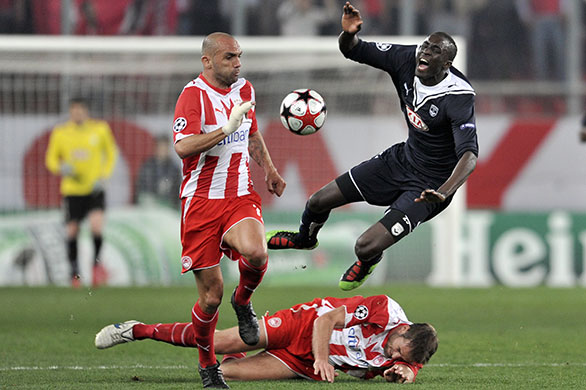 Wednesday football: Bordeaux's Ludovic Sane screams out after fouled by Olympiacos' Raoul Bravo