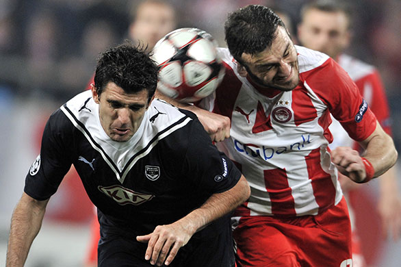 Wednesday football: Bordeaux's Fernando fights for the ball with Olympiacos' Vasilis Torosidis