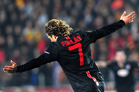 Europa League: Diego Forlan celebrates scoring the winning goal