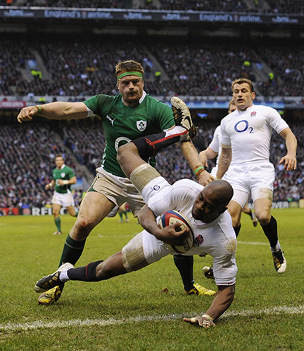 England v Ireland: Jamie Heaslip barges Ugo Monye into touch