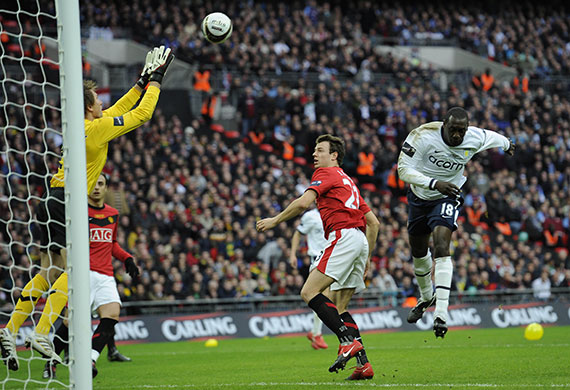 Carling Cup Final: Emile Heskey's header is safely gathered by United's goalkeeper